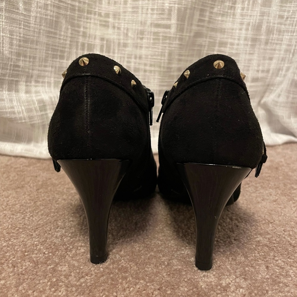 Dressy black bootie heels with gold buckle